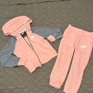 Two Nike sets for a 2/3-year-old girl.